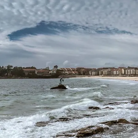 Un Descanso Disfrutando La Playa サンシェンショ